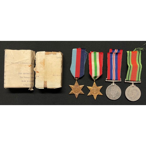 3022 - WW2 British Medal Group comprising of: 1939-45 Star, Italy Star, War Medal and Defence Medal, all co... 