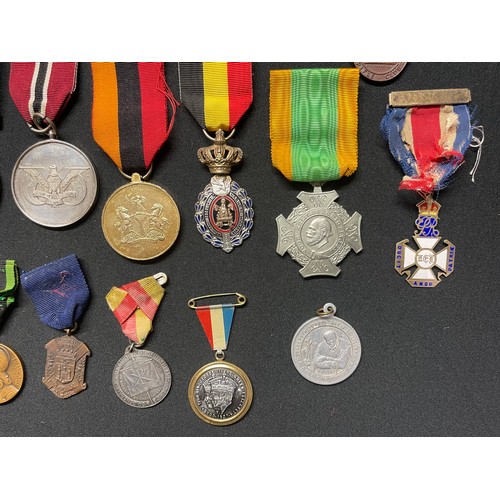 3043 - A collection of misc. World Medals to include: WW2 US Good Conduct Medal in box with ribbon bar and ... 