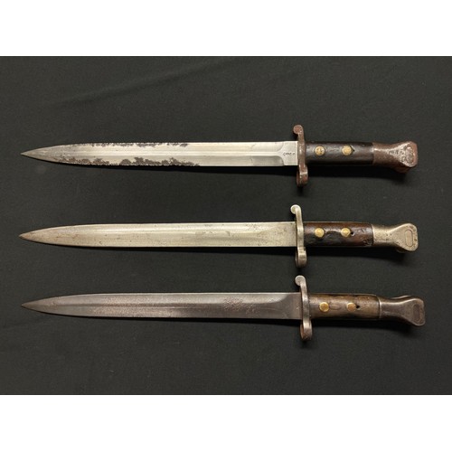 3070 - A collection of three Lee Metford bayonets: One maker marked 