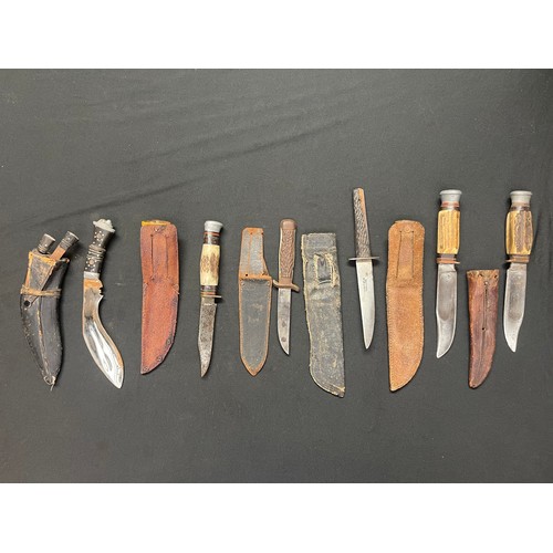 3212 - Six stag handled hunting knives and a small kukri knife. (6)