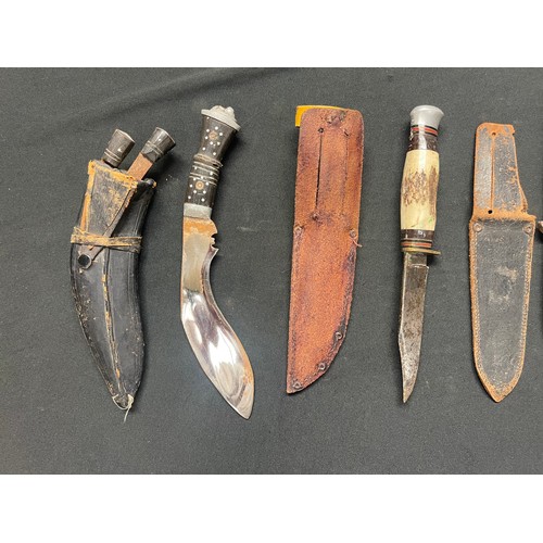 3212 - Six stag handled hunting knives and a small kukri knife. (6)