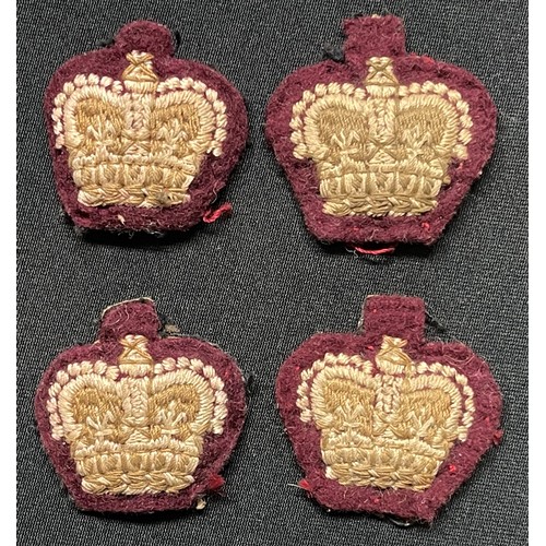 3250 - A sellection of post war RAMC insignia and buttons to include: two pairs of Worsted wool RAMC Majors... 