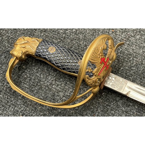 3251 - Spanish Army Officers Lion Head Sword with single edged fullered blade 760mm in length, marked 