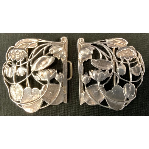 305 - A late Victorian Art Nouveau silver nurses belt buckle, Willian Comyns, London 1900, 2.88oz