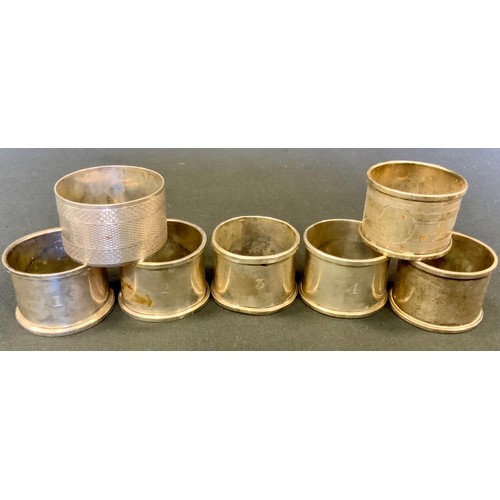 307 - A matched set of four silver napkin rings, others various, 6.35oz, (7)