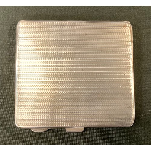 313 - A silver cigarette case, engine turned, 4.5oz