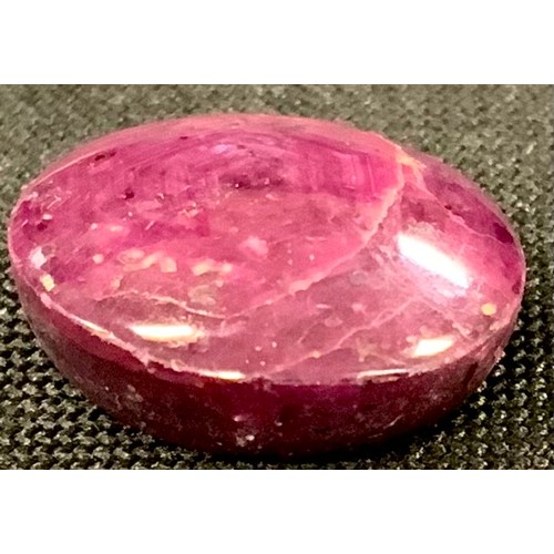 316 - Loose Gemstones - an oval cabochon cut ruby, 7.13ct, IGLI & I certificate