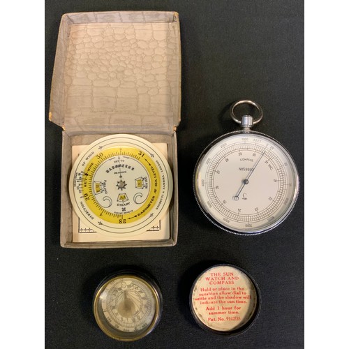 319 - A Negretti and Zambra pocket forecaster, boxed;  a chrome stop watch;  a  Beetleware Bakelite compas... 