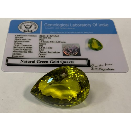 327 - Loose Gemstone - a natural green gold quartz, pear cut, 86.6ct, GLI  certificate