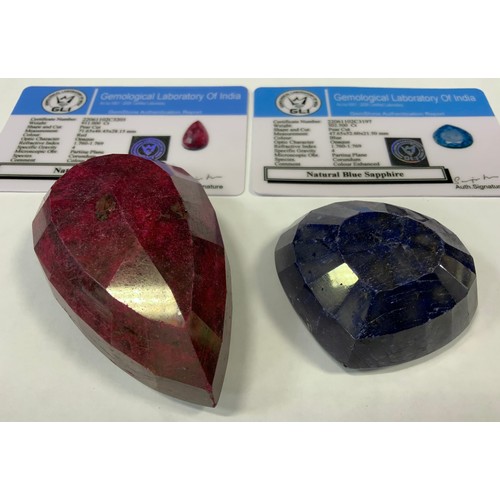 338 - Loose Gemstone - an extremely large natural ruby, pear cut, 911ct, GLI certificate;  another, natura... 