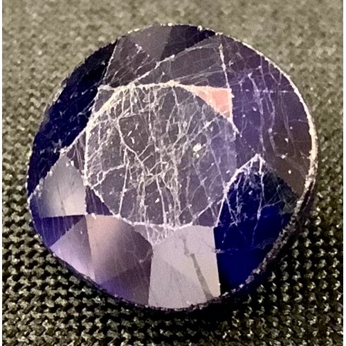 345 - Loose Gemstones - an oval mixed cut blue sapphire, 7.46ct, UGL/ ITGLR  certificates