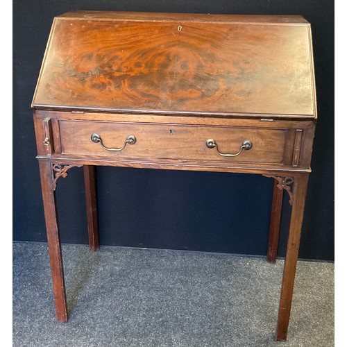 285 - A 20th century mahogany bureau. fall front, fitted interior, tapering legs, 95cm high, 78cm wide,  4... 