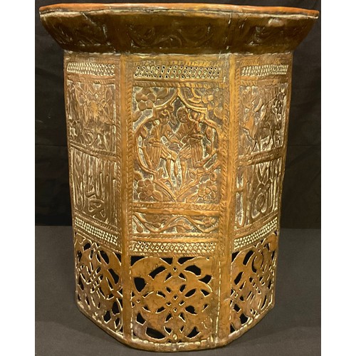 70 - A 19th century Islamic brass octagonal table, Islamic script, figures, animals, 39x35cm