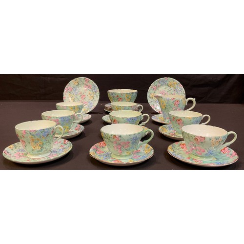 72 - A Shelley Melody pattern chintz tea set, comprising five teacups, saucers and tea plates with gilded... 