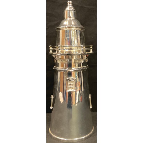 79 - An Art Deco style silver plated cocktail shaker as a lighthouse, 34cm high