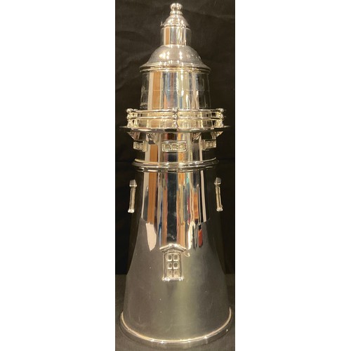 79 - An Art Deco style silver plated cocktail shaker as a lighthouse, 34cm high