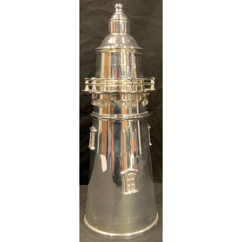 79 - An Art Deco style silver plated cocktail shaker as a lighthouse, 34cm high