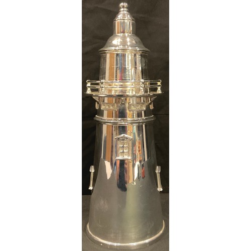 79 - An Art Deco style silver plated cocktail shaker as a lighthouse, 34cm high