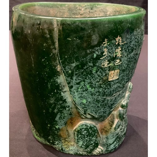 82 - A large contemporary Chinese carved green stone effect brush pot, decorated with figural landscape, ... 