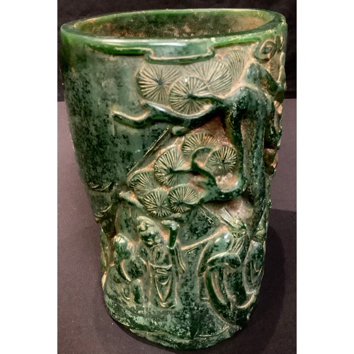 82 - A large contemporary Chinese carved green stone effect brush pot, decorated with figural landscape, ... 