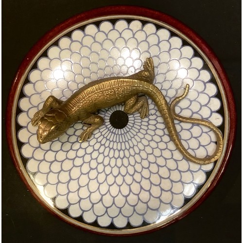 84 - A Continental porcelain circular box and cover, the cover mounted with a bronzed metal lizard, 14cm ... 