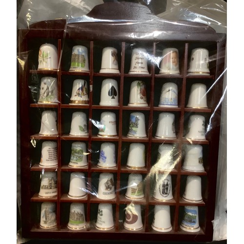 129 - Thimbles - assorted ceramic thimbles, some in collections, William Morris designs, Staffordshire The... 