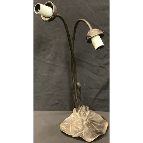 138 - An Art Nouveau style bronzed metal lily pad table lamp