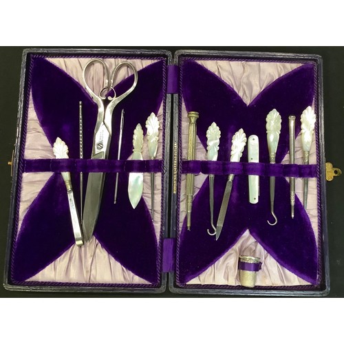 159 - A comprehensive Victorian cased sewing set, mother of pearl handles