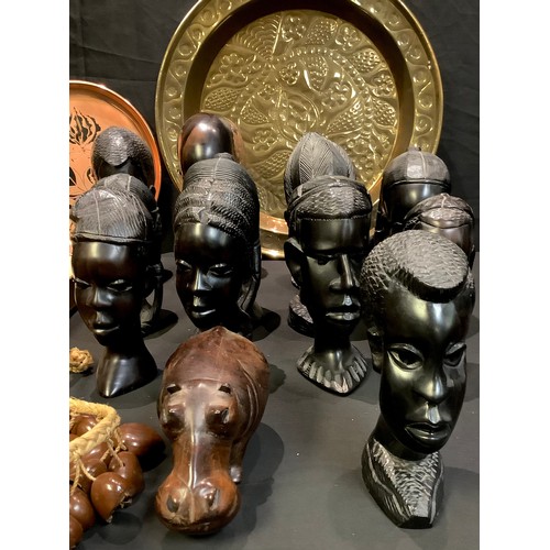 188 - Tribal Art - Africa and South Africa, assorted carved hardwood busts, a brass tray, a copper tray, a... 