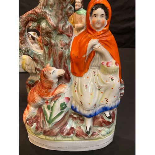 190 - A 19th century Staffordshire flatback spill vase, Red Riding Hood, 26cm; others, Biblical, reading g... 