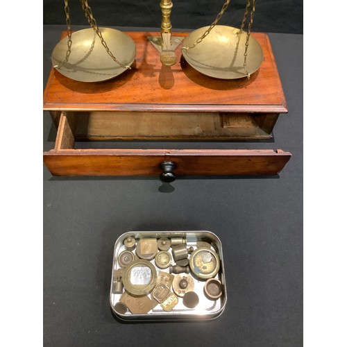 191 - A 19th century mahogany and brass apothecary balance scale and weights, c.1870