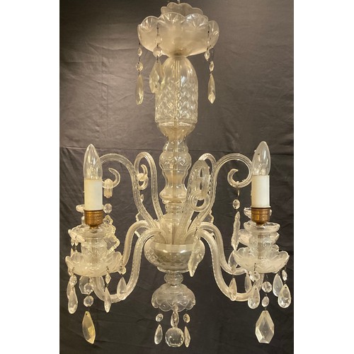 223 - A 20th century clear glass five light ceiling light, S scroll arms, prismatic droppers, 65cm high