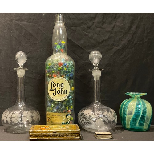 224 - A novelty marble filled Long John whisky bottle, once a table lamp, 43cm; a Mdina glass vase; a pair... 