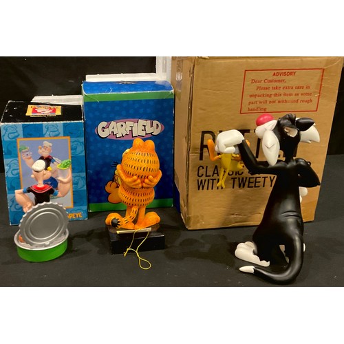 236 - A Warner Brothers Looney Tunes model, Sylvester and Tweety Pie, 24cm, c.2000, boxed; another Popeye,... 