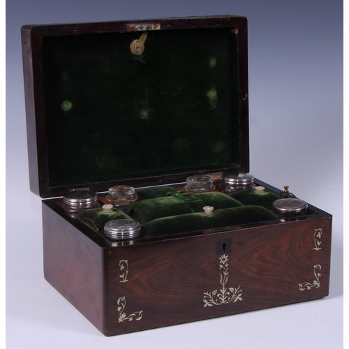 107 - A Victorian rosewood and mother of pearl marquetry travelling dressing box, hinged cover enclosing a... 