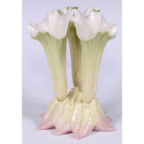 143 - An Edwardian Royal Worcester cluster spill vase, in the form of lily flowers, blush-tipped leaves, 1... 