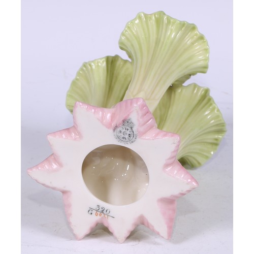 143 - An Edwardian Royal Worcester cluster spill vase, in the form of lily flowers, blush-tipped leaves, 1... 