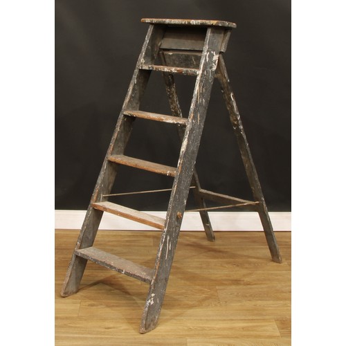 173 - A decorative rustic pine stepladder, 128cm high (open), 46cm wide