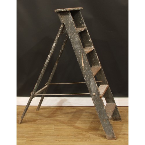 173 - A decorative rustic pine stepladder, 128cm high (open), 46cm wide