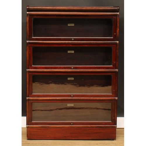 100 - A Globe Wernicke barrister's bookcase, comprising four modular stacking sections, each bearing label... 