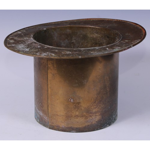 230 - A novelty brass Champagne bucket or wine cooler, as a top hat, 18cm high, 33.5cm wide, 27.5cm wide, ... 