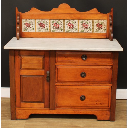 111 - A late Victorian marble top washstand, shaped and tiled gallery, oversailing rectangular top above a... 