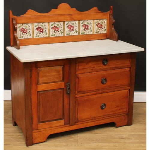 111 - A late Victorian marble top washstand, shaped and tiled gallery, oversailing rectangular top above a... 