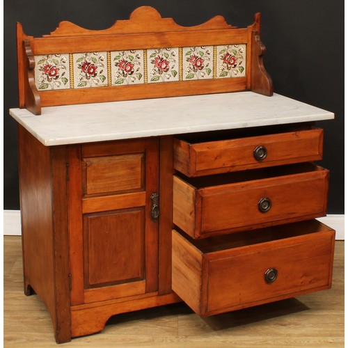 111 - A late Victorian marble top washstand, shaped and tiled gallery, oversailing rectangular top above a... 