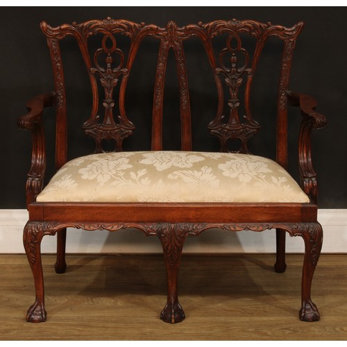 114 - Miniature Furniture - an Irish Chippendale design mahogany double chair back sofa, Cupid’s bow crest... 