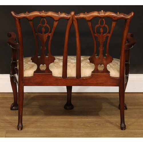 114 - Miniature Furniture - an Irish Chippendale design mahogany double chair back sofa, Cupid’s bow crest... 