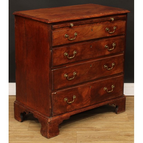 115 - A George III mahogany bachelor’s chest, rectangular top above a slide and four long graduated drawer... 