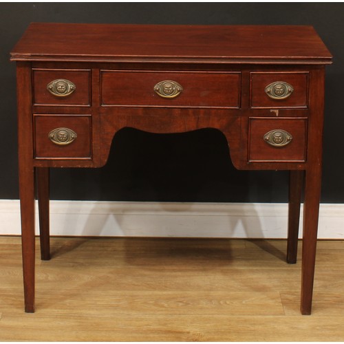 117 - A 19th century mahogany lowboy, moulded oversailing top above an arrangement of five cockbeaded draw... 