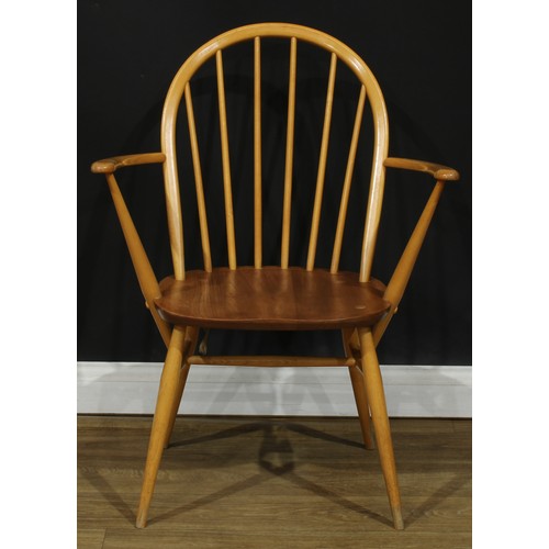 118 - Three Ercol Windsor arm chairs, the largest 88.5cm high, 66.5cm wide, the seat 41cm wide and 35cm de... 