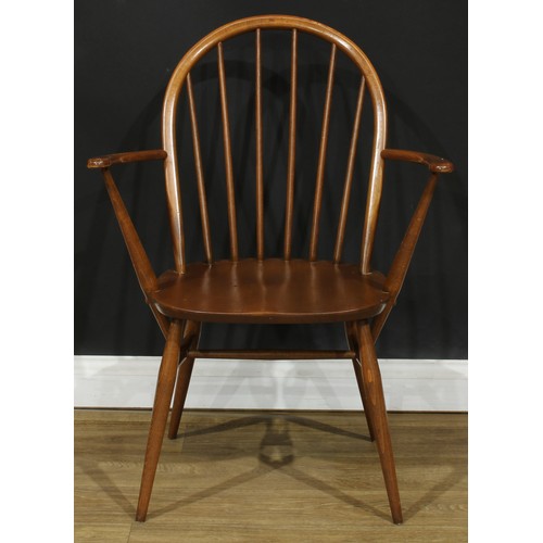 118 - Three Ercol Windsor arm chairs, the largest 88.5cm high, 66.5cm wide, the seat 41cm wide and 35cm de... 